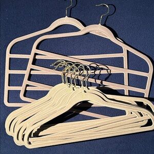 Authentic Huggable Hangers. 10 full singles and 2 trousers/jeans multi hanger.